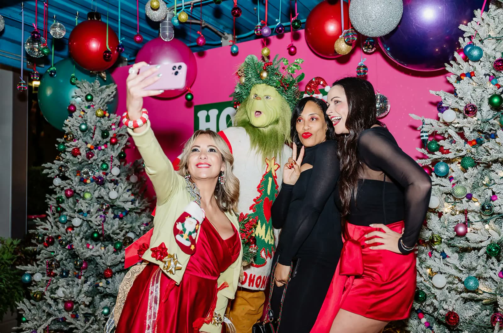 Festive corporate holiday party with branded photo experiences