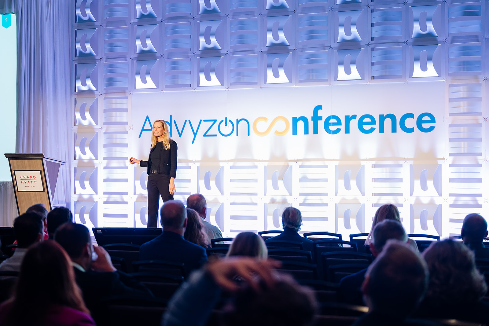 Keynote speaker on stage at Advyzon Conference at Grand Hyatt Tampa Bay