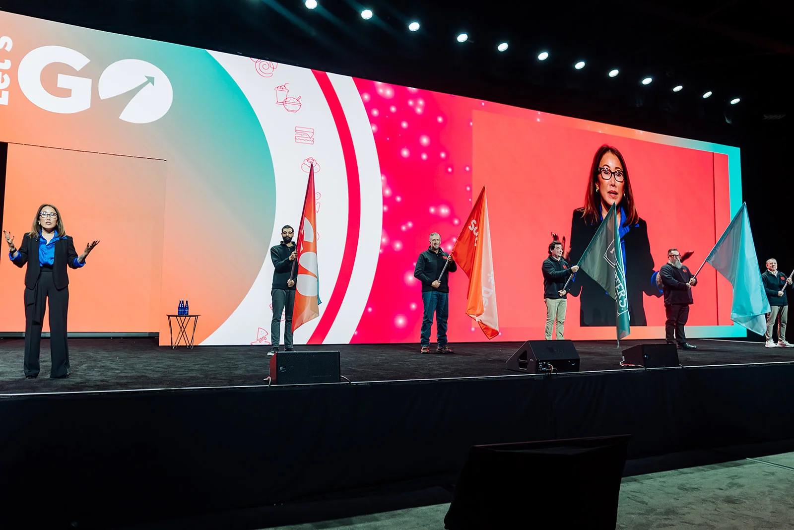GoTo Foods brand flag ceremony on the Let's Go main stage at the Atlanta franchise conference