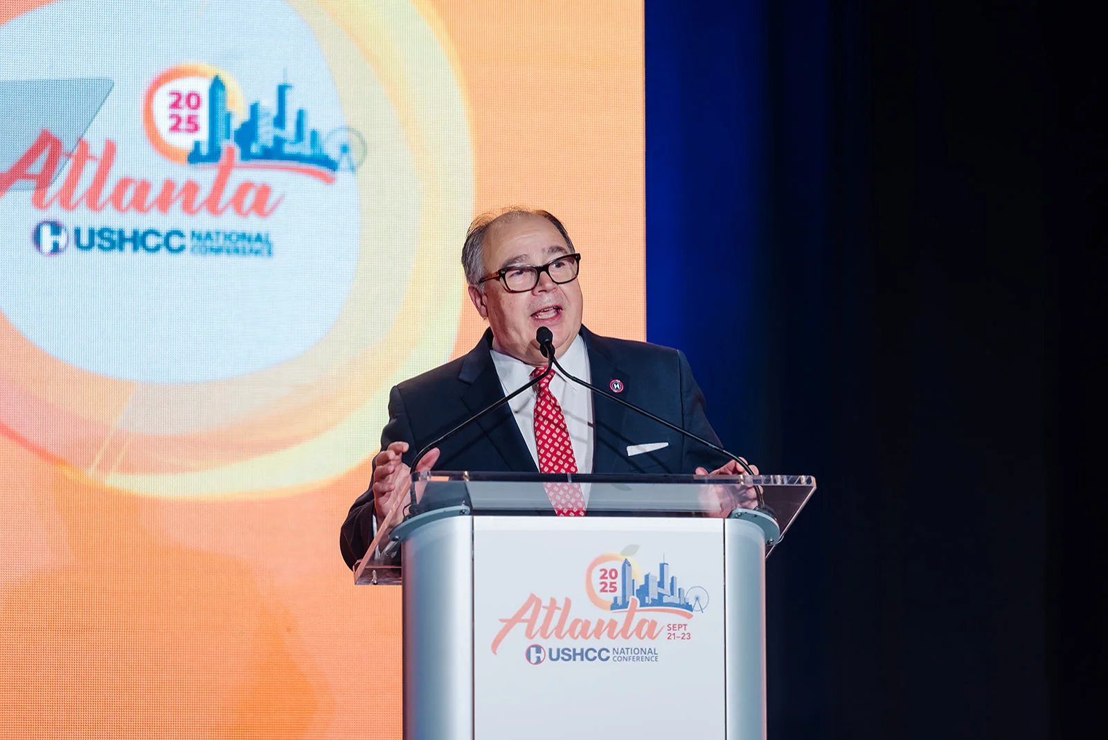 Keynote speaker at the podium during the 2025 USHCC National Conference in Atlanta
