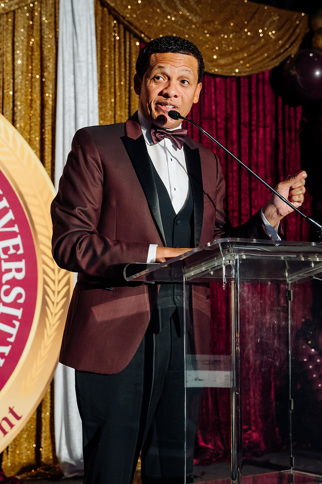 Dr. Albert Mosley speaking at the podium during the Bethune-Cookman University inauguration gala