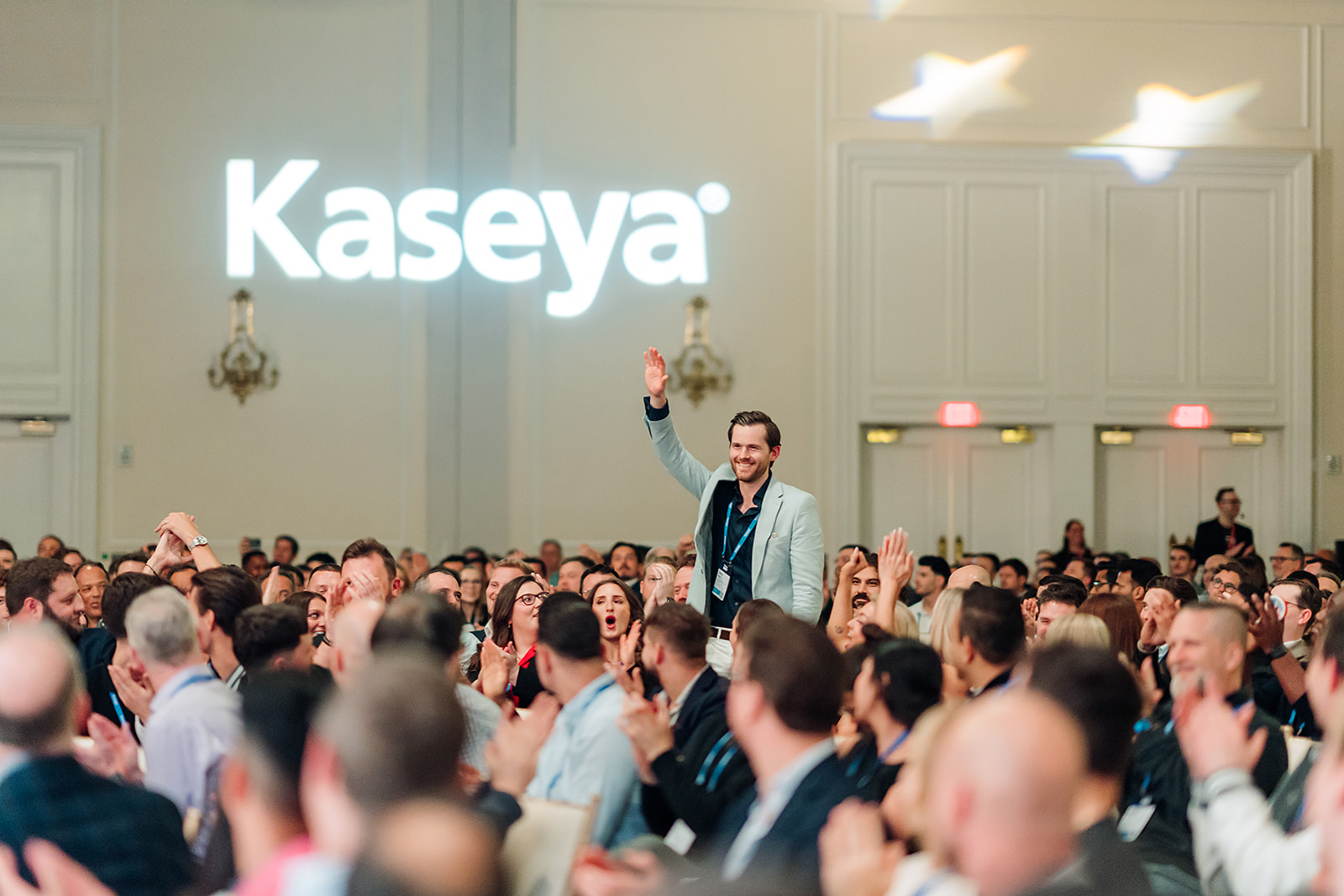 Kaseya SKO attendee being recognized with standing ovation in Miami
