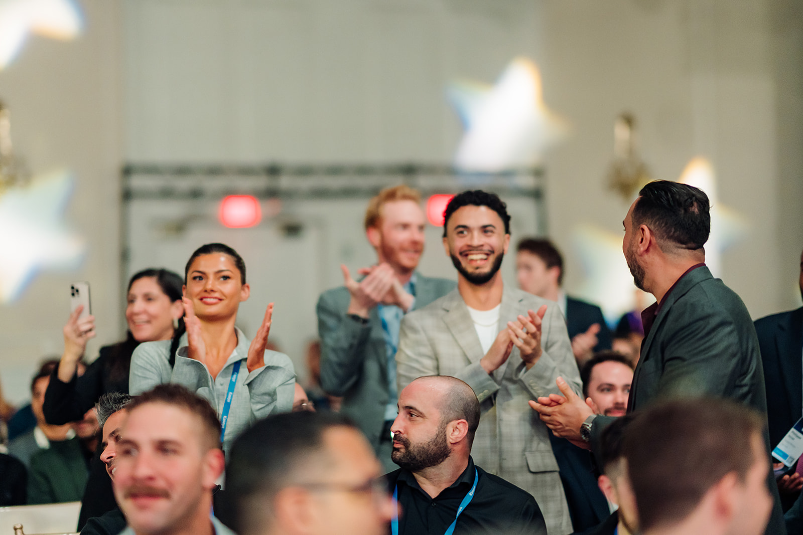 Kaseya SKO attendees celebrating an award announcement in Miami