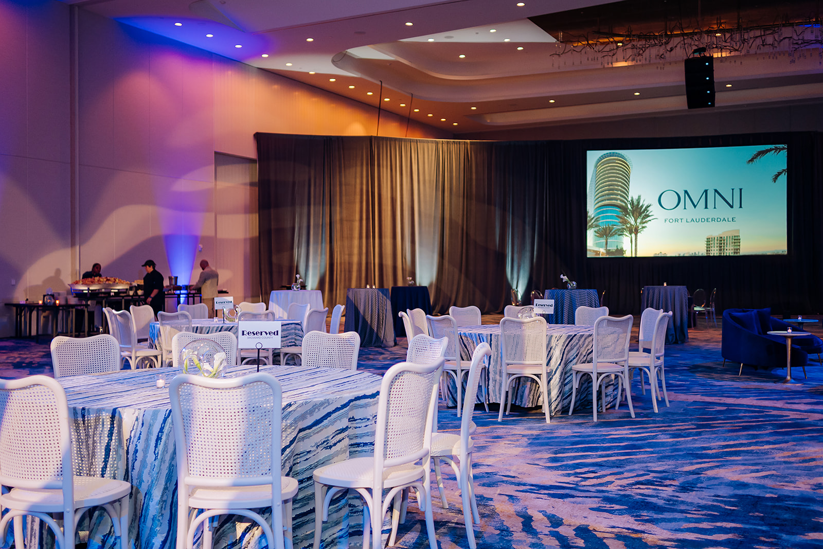 Corporate reception ballroom at Omni Fort Lauderdale with branded screens