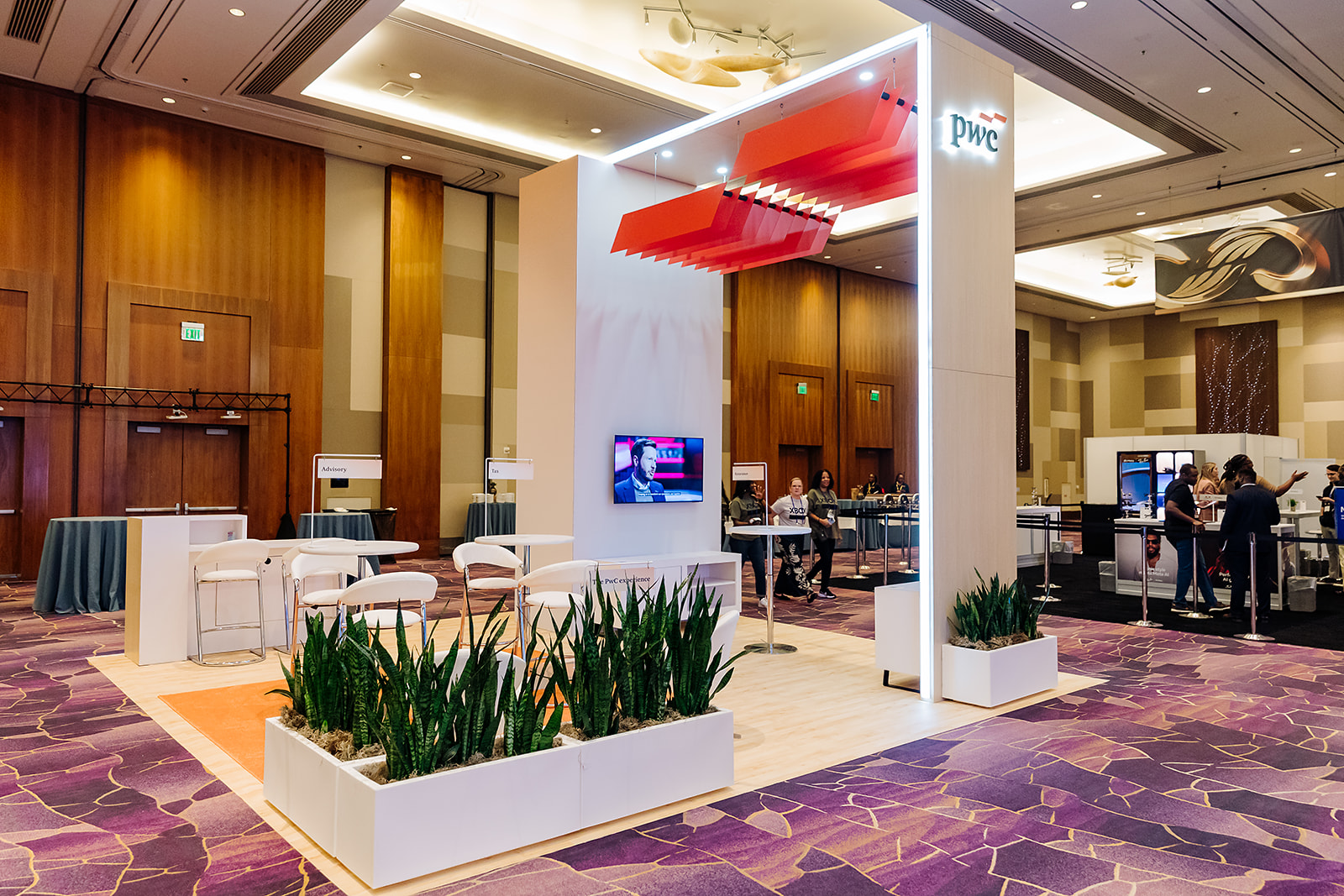 The PwC Experience branded booth activation at corporate conference