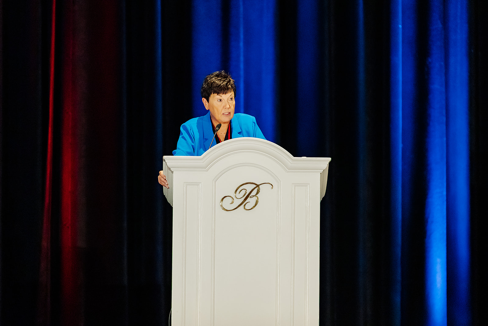 Shock Society keynote speaker at Bellagio podium in Las Vegas