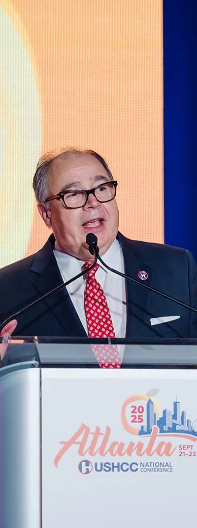 Keynote speaker at the podium during the 2025 USHCC National Conference in Atlanta