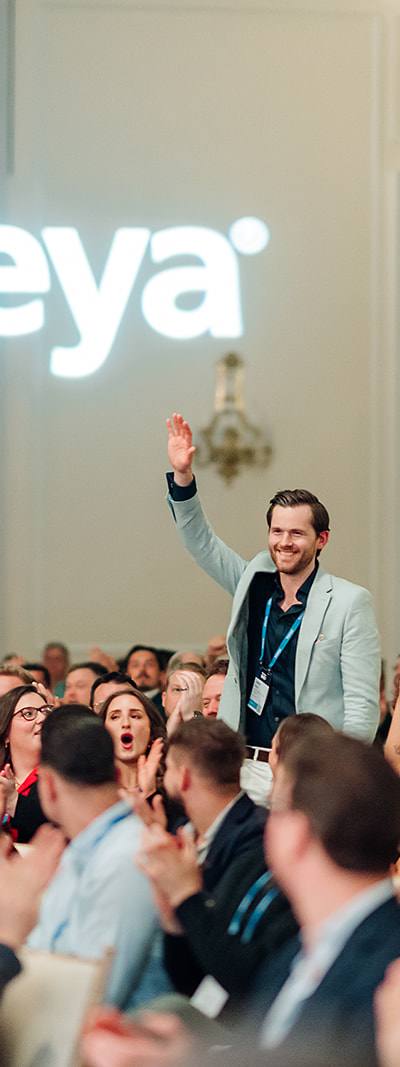 Kaseya SKO attendee being recognized with standing ovation in Miami