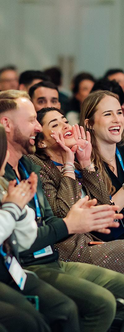 Engaged Kaseya SKO audience laughing and applauding during keynote in Miami