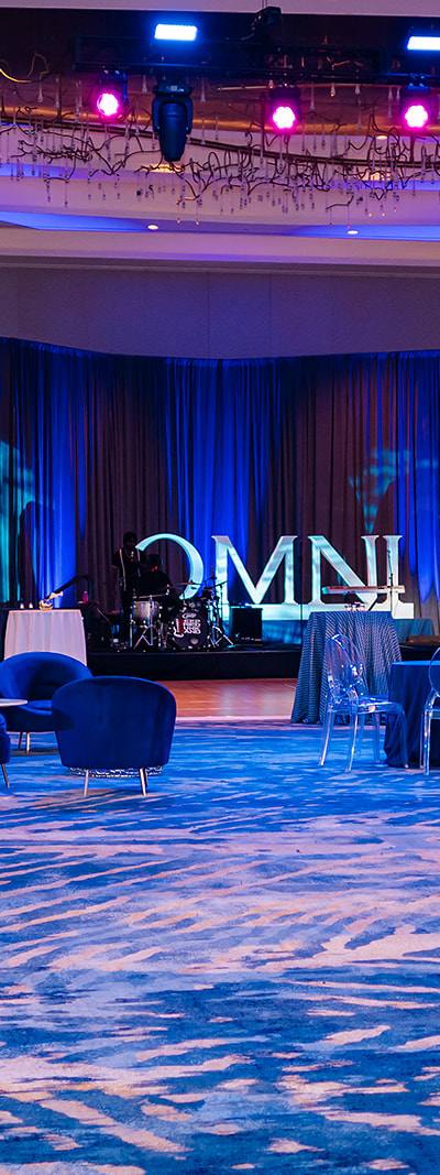 Corporate event stage and lounge at Omni Fort Lauderdale