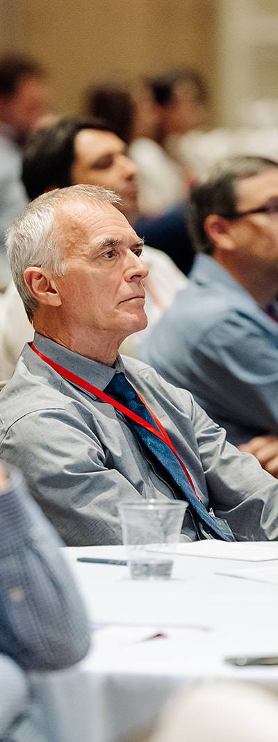 Attendees listening during Shock Society conference session in Las Vegas